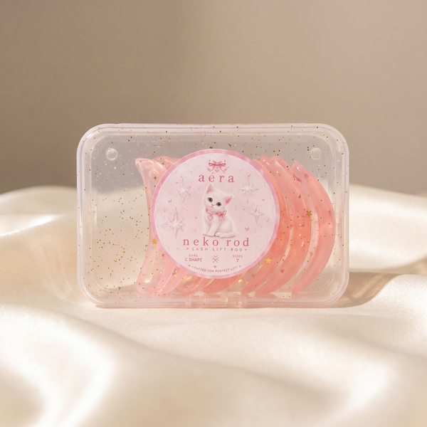 Curling rod set in clear plastic case with pink spiral rods and cat graphic