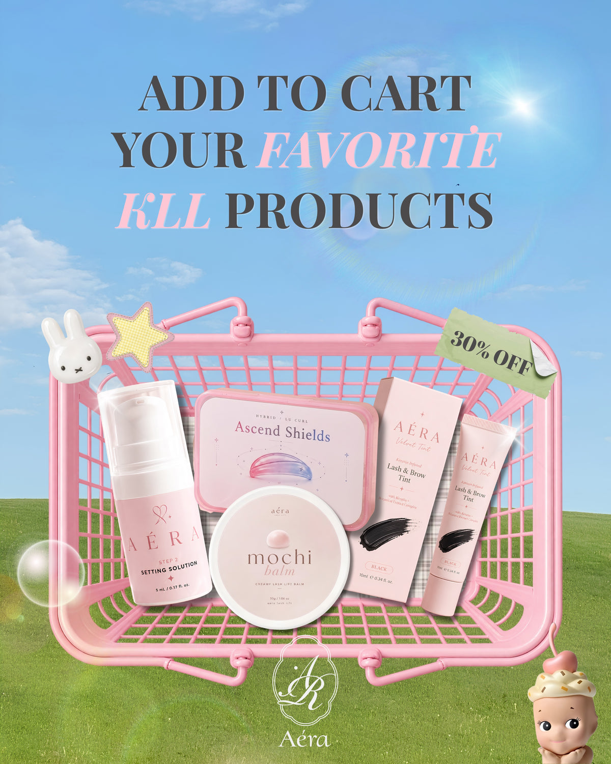 AÉRA K-Lift skincare set with bottle, jar, tubes, box, and bunny charm