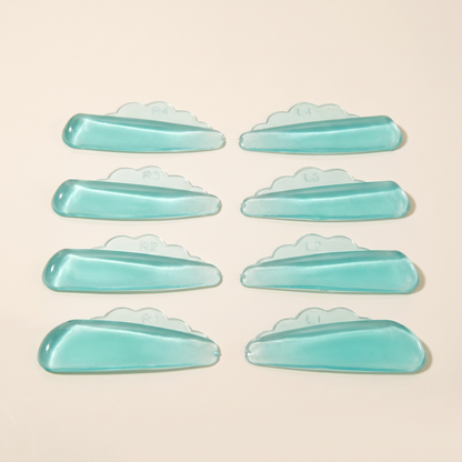 Mint teal V-curl lash perm rods, multiple curved rods with size markings