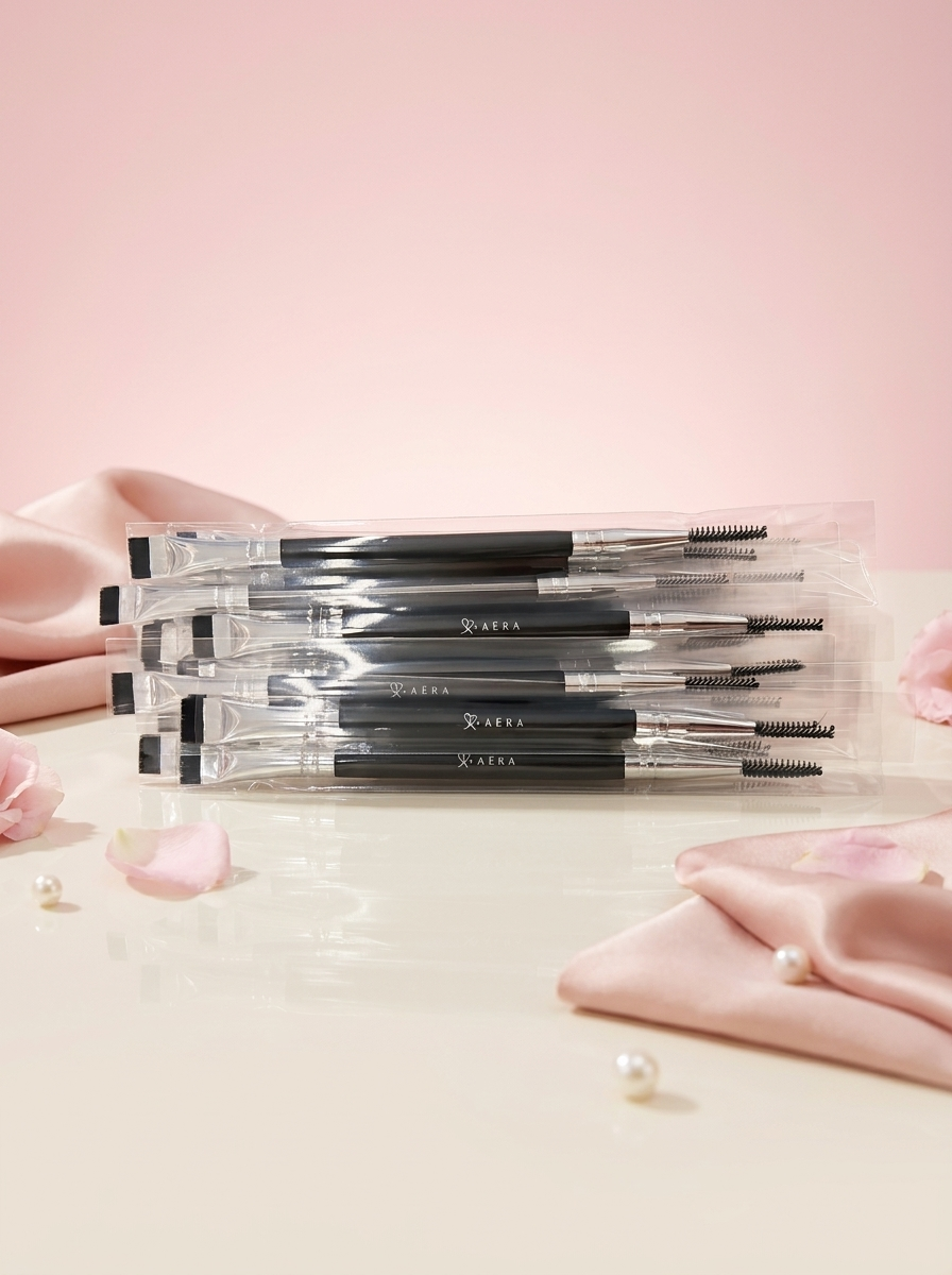 Dual-ended spoolie makeup brush set in clear tubes, black tips
