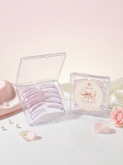 AÉRA Rosette Rod lash set in clear storage cases with pink lash strips