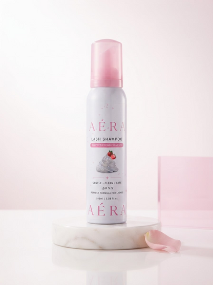 AÉRA Whipped Cream Lash Shampoo bottle with pink cap on white base