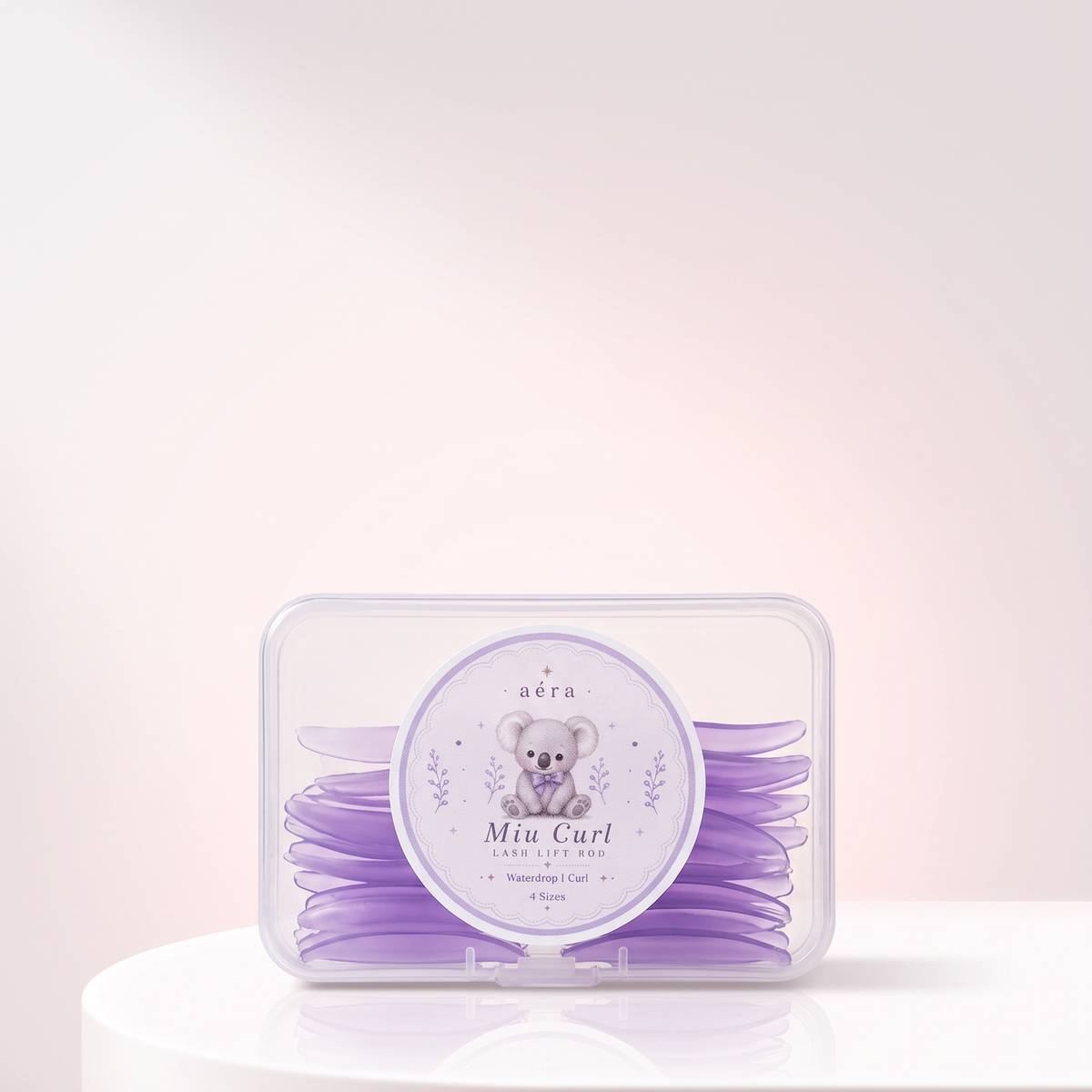 Miu Curl purple silicone perm pads in clear storage case, with illustrated label