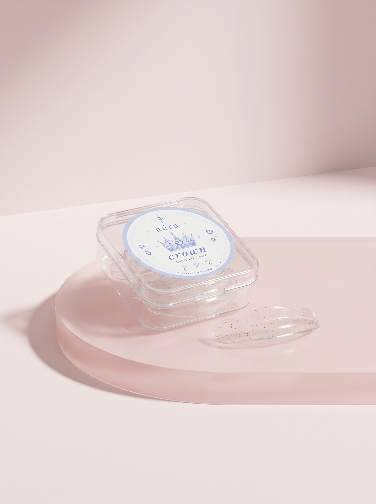 Crown Rod resting in open clear case on pink base